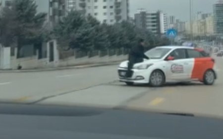 Tartışma sonrası aracın kaputunda metrelerce sürüklendi