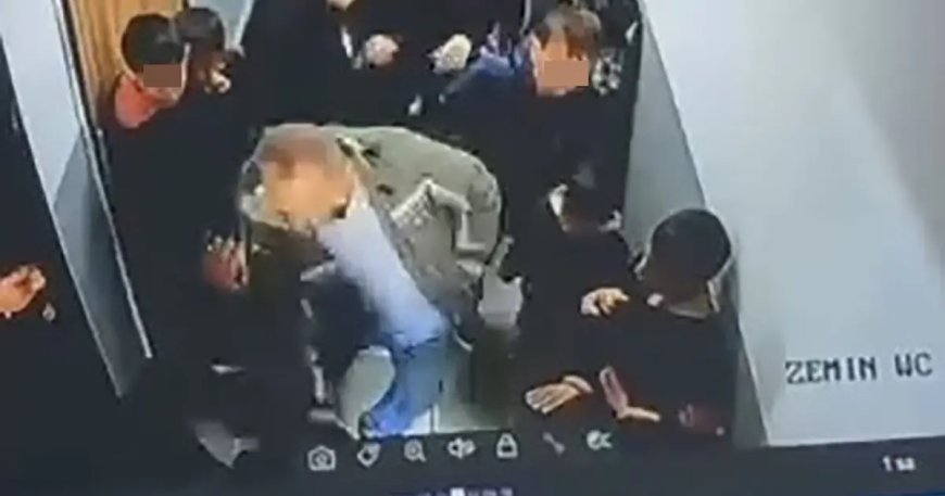 Çocuğuna kartopu atan öğrenciyi koridorda darp etti